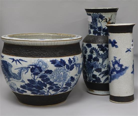 A Chinese blue and white crackleglaze jardiniere and two vases